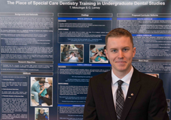 Tobias Meiszinger posing in front of their poster