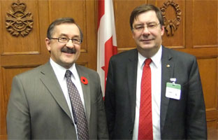 Ed Komarnicki (left) Dr. Benoit Soucy